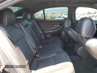 2013 Ford Taurus Limited z VIN 1FAHP2F83DG126069, wystawiony jako Copart lot #56520615 z przebiegiem 234 454 mil mil oraz Szkoda całkowita • Salvage title. Historia ofert i sprzedaży dostępna na DreamBid. Obrazek 10.