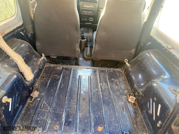 2003 Jeep Wrangler SE with VIN 1J4FA29143P371506, listed as a Copart auction lot 80153184 with 101,513 mi miles and Clean Title. Bid and sale history available at carsss.com. Image 6.