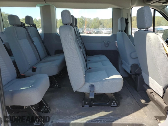 2015 Ford Transit XL z VIN 1FBZX2CM8FKA64060, wystawiony jako Copart lot #74784034 z przebiegiem 33 249 mil mil oraz Szkoda całkowita • Salvage title. Historia ofert i sprzedaży dostępna na DreamBid. Obrazek 11.