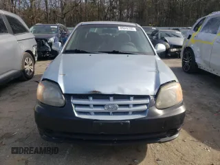 2004 Hyundai Accent GL with VIN KMHCG35C44U303127, listed as a Copart auction lot 88642335 with 155,032 mi miles and Salvage Title. Bid and sale history available at carsss.com. Image 5.