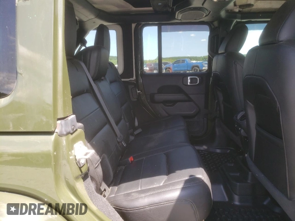 2021 Jeep Wrangler Unlimited Sahara Altitude z VIN 1C4HJXEN8MW794195, wystawiony jako Copart lot #61269515 z przebiegiem 28 118 mil mil oraz Szkoda całkowita • Salvage title. Historia ofert i sprzedaży dostępna na DreamBid. Obrazek 11.