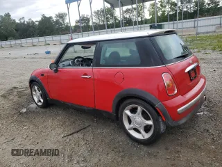 2002 MINI Hardtop with VIN WMWRC33422TE12260, listed as a Copart auction lot 66409484 with 112,119 mi miles and Salvage Title. Bid and sale history available at DreamBid. Image 2.