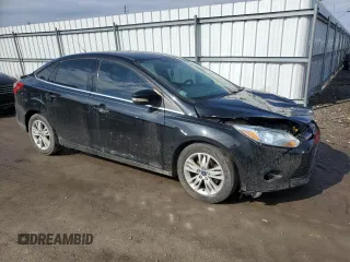 2012 Ford Focus SEL with VIN 1FAHP3H20CL329098, listed as a Copart auction lot 46990485 with 131,783 mi miles and Salvage Title. Bid and sale history available at DreamBid. Image 4.