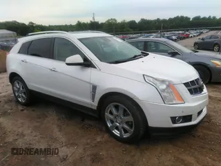 2012 Cadillac SRX Performance Collection with VIN 3GYFNBE32CS653172, listed as a IAAI auction lot 42287435 with 161,065 mi miles and . Bid and sale history available at DreamBid. Image 1.