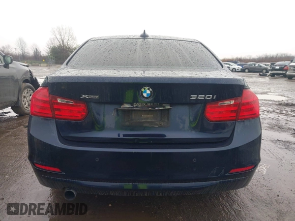 2015 BMW 3 Series 320i xDrive with VIN WBA3C3C57FP664631, listed as a IAAI auction lot 41117730 with 102,555 mi miles and . Bid and sale history available at DreamBid. Image 16.