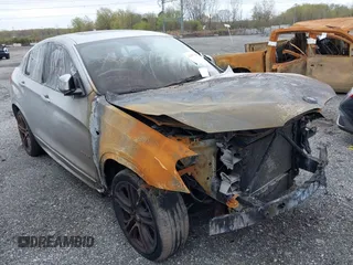 2016 BMW X4 xDrive28i with VIN 5UXXW3C55G0R20074, listed as a IAAI auction lot 42067204 with 91,169 mi miles. Bid and sale history available at carsss.com. Image 1.
