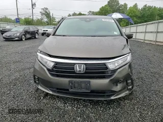 2022 Honda Odyssey EX z VIN 5FNRL6H57NB033507, wystawiony jako Copart lot #60975875 z przebiegiem 82 836 mil mil oraz Szkoda całkowita • Salvage title. Historia ofert i sprzedaży dostępna na DreamBid. Obrazek 14.