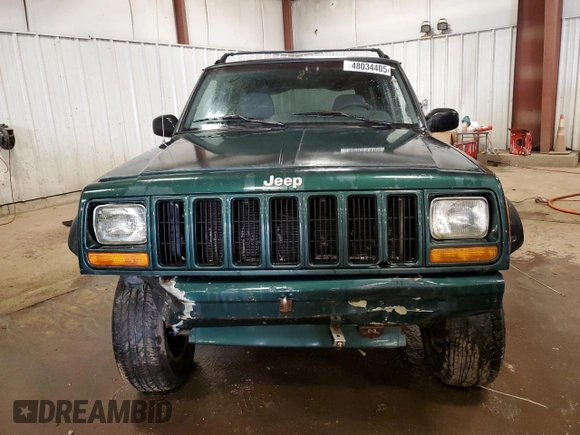1997 Jeep Cherokee Country with VIN 1J4FJ78S8VL577137, listed as a Copart auction lot 48034405 with 156,154 mi miles and Salvage Title. Bid and sale history available at carsss.com. Image 5.