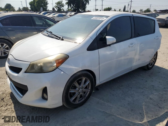 2012 Toyota Yaris L with VIN JTDKTUD30CD527531, listed as a Copart auction lot 65022015 with 157,177 mi miles and Salvage title. Bid and sale history available at DreamBid. Image 1.