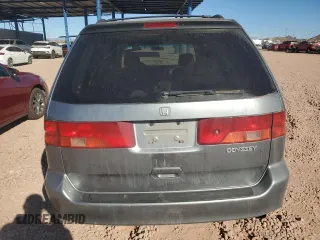 1999 Honda Odyssey EX with VIN 2HKRL1860XH541737, listed as a Copart auction lot 88897965 with 112,164 mi miles and Salvage title. Bid and sale history available at DreamBid. Image 6.