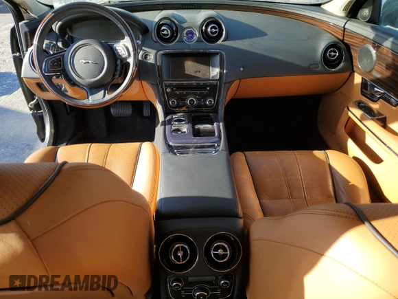2013 Jaguar XJ with VIN SAJWA2GB0DLV43865, listed as a Copart auction lot 79693934 with 0 mi miles and Salvage Title. Bid and sale history available at carsss.com. Image 8.