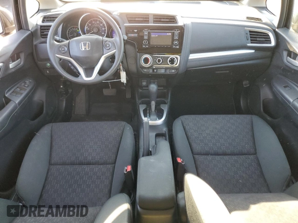 2016 Honda Fit LX with VIN 3HGGK5H56GM704864, listed as a Copart auction lot 75690264 with 54,543 mi miles and Salvage title. Bid and sale history available at DreamBid. Image 8.
