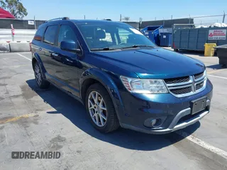 2013 Dodge Journey Crew with VIN 3C4PDCDG1DT627830, listed as a IAAI auction lot 42403146 with 131,955 mi miles and . Bid and sale history available at DreamBid. Image 1.