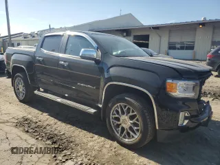 2021 GMC Canyon 4WD Denali with VIN 1GTG6EEN4M1221938, listed as a Copart auction lot 48760965 with 63,231 mi miles and Salvage Title. Bid and sale history available at carsss.com. Image 4.