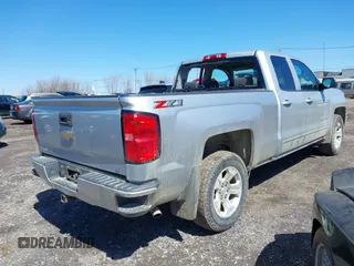 2018 Chevrolet Silverado 1500 LT with VIN 1GCVKREC8JZ237565, listed as a IAAI auction lot 42052619 with 92,790 mi miles and . Bid and sale history available at DreamBid. Image 4.