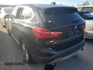 2018 BMW X1 xDrive28i with VIN WBXHT3C37J5K27694, listed as a Copart auction lot 64022772 with 59,413 mi miles. Bid and sale history available at carsss.com. Image 3.