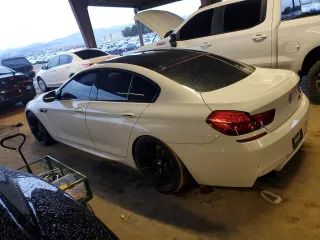 2015 BMW M6 z VIN WBS6C9C59FD467571, wystawiony jako Copart lot #85105724 z przebiegiem 128 295 mil mil oraz Czysty tytuł • Clean title. Historia ofert i sprzedaży dostępna na DreamBid. Obrazek 2.