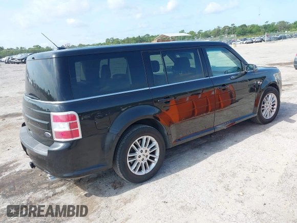 2014 Ford Flex SEL z VIN 2FMGK5C8XEBD13484, wystawiony jako IAAI lot #42235548 z przebiegiem 172 570 mil mil oraz . Historia ofert i sprzedaży dostępna na DreamBid. Obrazek 4.