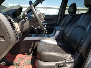 2008 Mercury Mariner with VIN 4M2CU91128KJ11544, listed as a Copart auction lot 68621264 with 219,443 mi miles and Salvage Title. Bid and sale history available at carsss.com. Image 7.