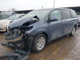 2016 Toyota Sienna XLE with VIN 5TDYK3DC6GS724835, listed as a IAAI auction lot 41477632 with 125,679 mi miles. Bid and sale history available at carsss.com. Image 16.