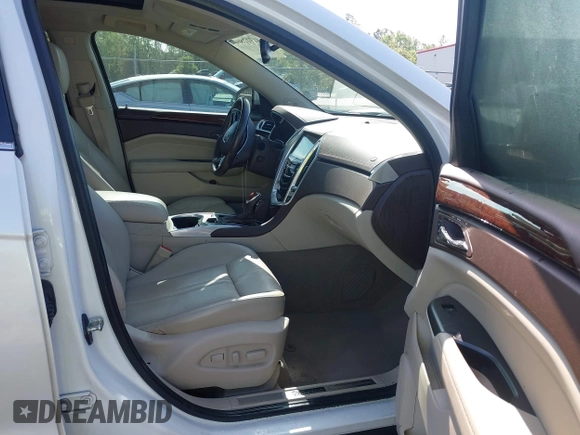 2013 Cadillac SRX Luxury Collection with VIN 3GYFNCE33DS608040, listed as a IAAI auction lot 41912860 with 128,295 mi miles and . Bid and sale history available at DreamBid. Image 5.