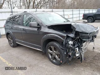 2015 Dodge Journey Crossroad with VIN 3C4PDCGB0FT639390, listed as a IAAI auction lot 41881370 with 164,219 mi miles and . Bid and sale history available at DreamBid. Image 1.