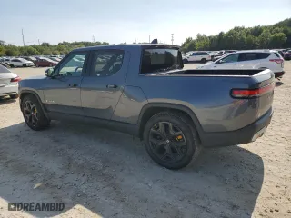 2022 Rivian R1T Adventure Package with VIN 7FCTGAAA7NN015041, listed as a Copart auction lot 70955194 with 45,469 mi miles and Salvage Title. Bid and sale history available at carsss.com. Image 2.