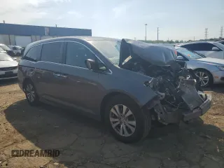 2014 Honda Odyssey EX-L with VIN 5FNRL5H61EB046093, listed as a Copart auction lot 61930335 with Not provided miles and Salvage title. Bid and sale history available at DreamBid. Image 4.