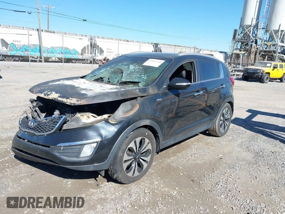 2013 Kia Sportage SX with VIN KNDPCCA68D7374637, listed as a IAAI auction lot 41810746 with Not Provided miles and . Bid and sale history available at carsss.com. Image 2.