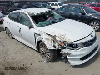 2016 Kia Optima EX with VIN 5XXGU4L31GG054125, listed as a IAAI auction lot 42312845 with 135,916 mi miles and . Bid and sale history available at DreamBid. Image 1.