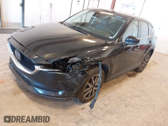 2018 Mazda CX-5 Touring with VIN JM3KFBCM9J0437490, listed as a IAAI auction lot 42006998 with 176,959 mi miles. Bid and sale history available at carsss.com. Image 17.