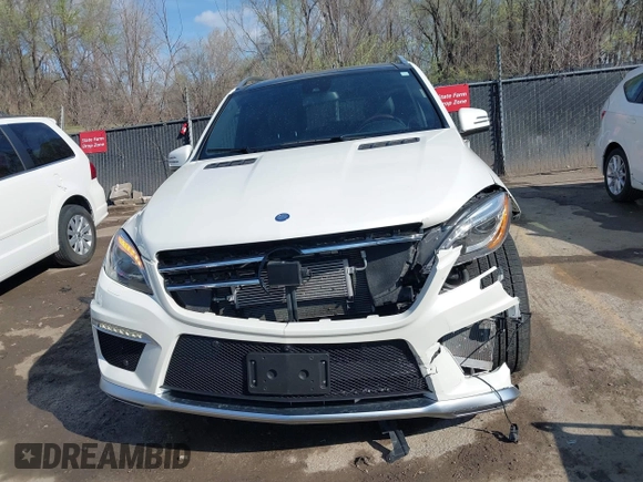 2015 Mercedes-Benz M 63 AMG with VIN 4JGDA7EB6FA471585, listed as a IAAI auction lot 41883006 with 39,243 mi miles and . Bid and sale history available at carsss.com. Image 6.