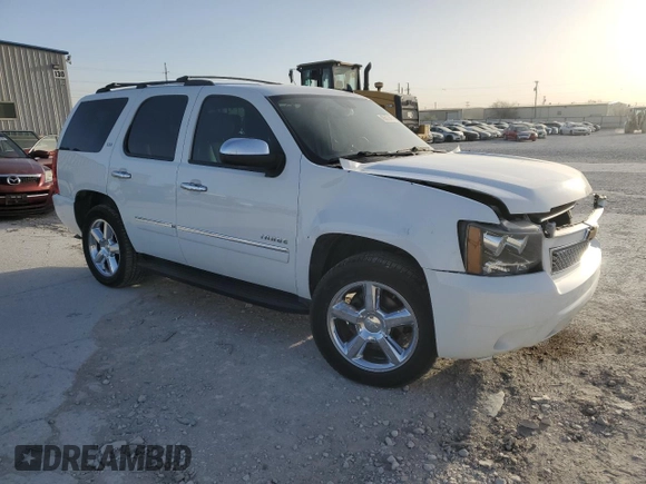 2013 Chevrolet Tahoe LTZ with VIN 1GNSCCE08DR102648, listed as a Copart auction lot 49677345 with 226,528 mi miles and Salvage title. Bid and sale history available at DreamBid. Image 4.
