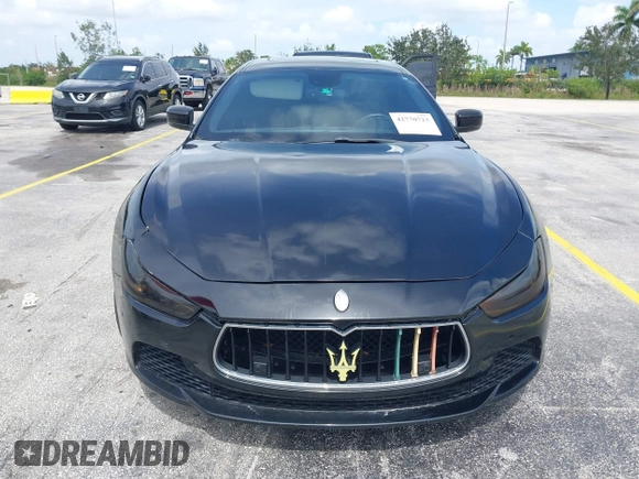 2015 Maserati Ghibli with VIN ZAM57XSA1F1144073, listed as a IAAI auction lot 42770723 with 105,782 mi miles and . Bid and sale history available at DreamBid. Image 6.