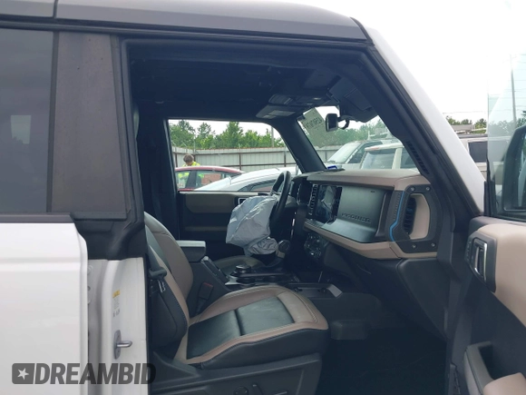 2023 Ford Bronco z VIN 1FMEE5DP2PLB16493, wystawiony jako IAAI lot #42507079 z przebiegiem 59 656 mil mil oraz . Historia ofert i sprzedaży dostępna na DreamBid. Obrazek 5.