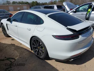 2018 Porsche Panamera 4 E-Hybrid z VIN WP0AE2A73JL129993, wystawiony jako IAAI lot #41602216 z przebiegiem 53 426 mil mil oraz . Historia ofert i sprzedaży dostępna na DreamBid. Obrazek 3.