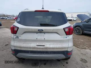 2019 Ford Escape Titanium with VIN 1FMCU9J97KUB85528, listed as a IAAI auction lot 41708344 with 88,841 mi miles. Bid and sale history available at carsss.com. Image 16.
