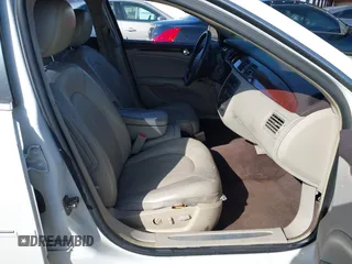 2009 Buick Lucerne CXL with VIN 1G4HD57M19U109257, listed as a IAAI auction lot 42064449 with 153,665 mi miles. Bid and sale history available at carsss.com. Image 5.