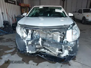 2014 Cadillac SRX Performance Collection with VIN 3GYFNFE36ES615440, listed as a IAAI auction lot 41830849 with 125,128 mi miles and . Bid and sale history available at DreamBid. Image 13.