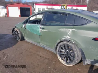 2022 Tesla Model X Plaid z VIN 7SAXCBE6XNF358023, wystawiony jako IAAI lot #41683857 z przebiegiem 42 821 mil mil oraz . Historia ofert i sprzedaży dostępna na DreamBid. Obrazek 6.