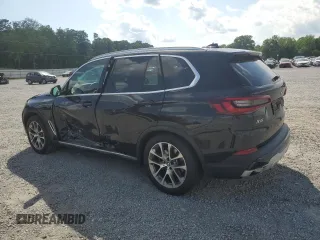 2021 BMW X5 xDrive45e with VIN 5UXTA6C02M9F50974, listed as a Copart auction lot 56358745 with 46,945 mi miles and Salvage title. Bid and sale history available at DreamBid. Image 2.