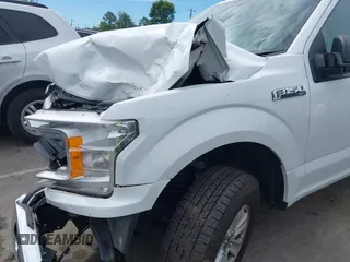 2019 Ford F-150 XL with VIN 1FTEW1E53KFD17091, listed as a IAAI auction lot 42320554 with 166,961 mi miles and . Bid and sale history available at DreamBid. Image 18.