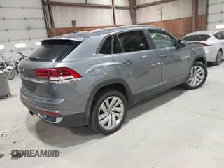 2022 Volkswagen Atlas SE z VIN 1V2KE2CA1NC206765, wystawiony jako IAAI lot #41876747 z przebiegiem 83 304 mil mil oraz . Historia ofert i sprzedaży dostępna na DreamBid. Obrazek 4.