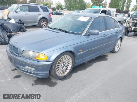 2001 BMW 3 Series 330i with VIN WBAAV53471JR79008, listed as a IAAI auction lot 42165063 with 215,409 mi miles and . Bid and sale history available at carsss.com. Image 2.