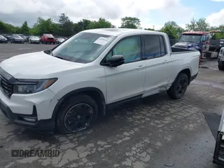 2023 Honda Ridgeline Black Edition with VIN 5FPYK3F88PB018969, listed as a IAAI auction lot 42264424 with 19,193 mi miles and . Bid and sale history available at DreamBid. Image 2.