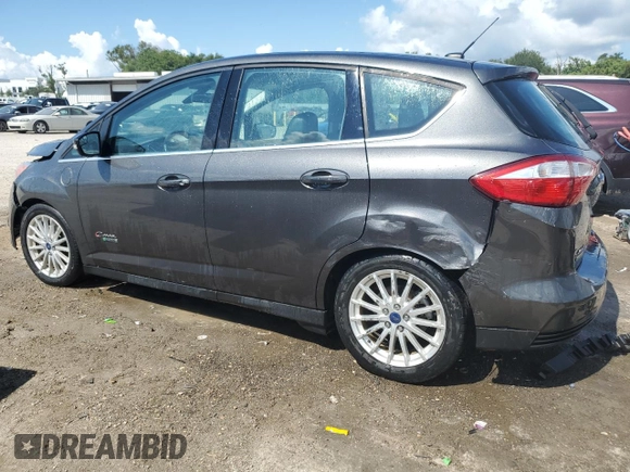 2016 Ford C-Max Energi SEL with VIN 1FADP5CU0GL101658, listed as a Copart auction lot 68214393 with 66,390 mi miles. Bid and sale history available at carsss.com. Image 2.