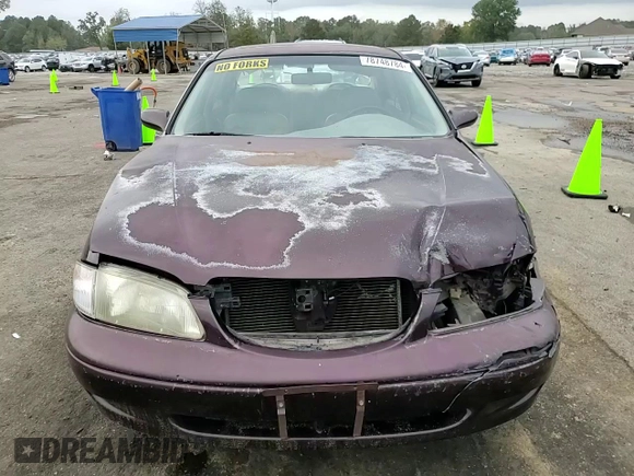1998 Mazda 626 DX z VIN 1YVGF22CXW5775511, wystawiony jako Copart lot #78748784 z przebiegiem 158 570 mil mil oraz Szkoda całkowita • Salvage title. Historia ofert i sprzedaży dostępna na DreamBid. Obrazek 11.