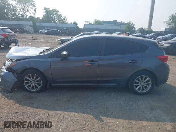 2018 Subaru Impreza with VIN 4S3GTAA63J3748319, listed as a IAAI auction lot 42441310 with 71,616 mi miles and . Bid and sale history available at DreamBid. Image 14.