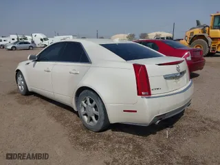 2009 Cadillac CTS AWD w/1SA with VIN 1G6DG577090138683, listed as a IAAI auction lot 41609963 with 212,178 mi miles. Bid and sale history available at carsss.com. Image 3.