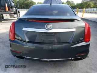 2014 Cadillac CTS Vsport Premium RWD z VIN 1G6AV5S80E0171279, wystawiony jako Copart lot #63759434 z przebiegiem 129 154 mil mil oraz Szkody całkowita. Historia ofert i sprzedaży dostępna na DreamBid. Obrazek 6.
